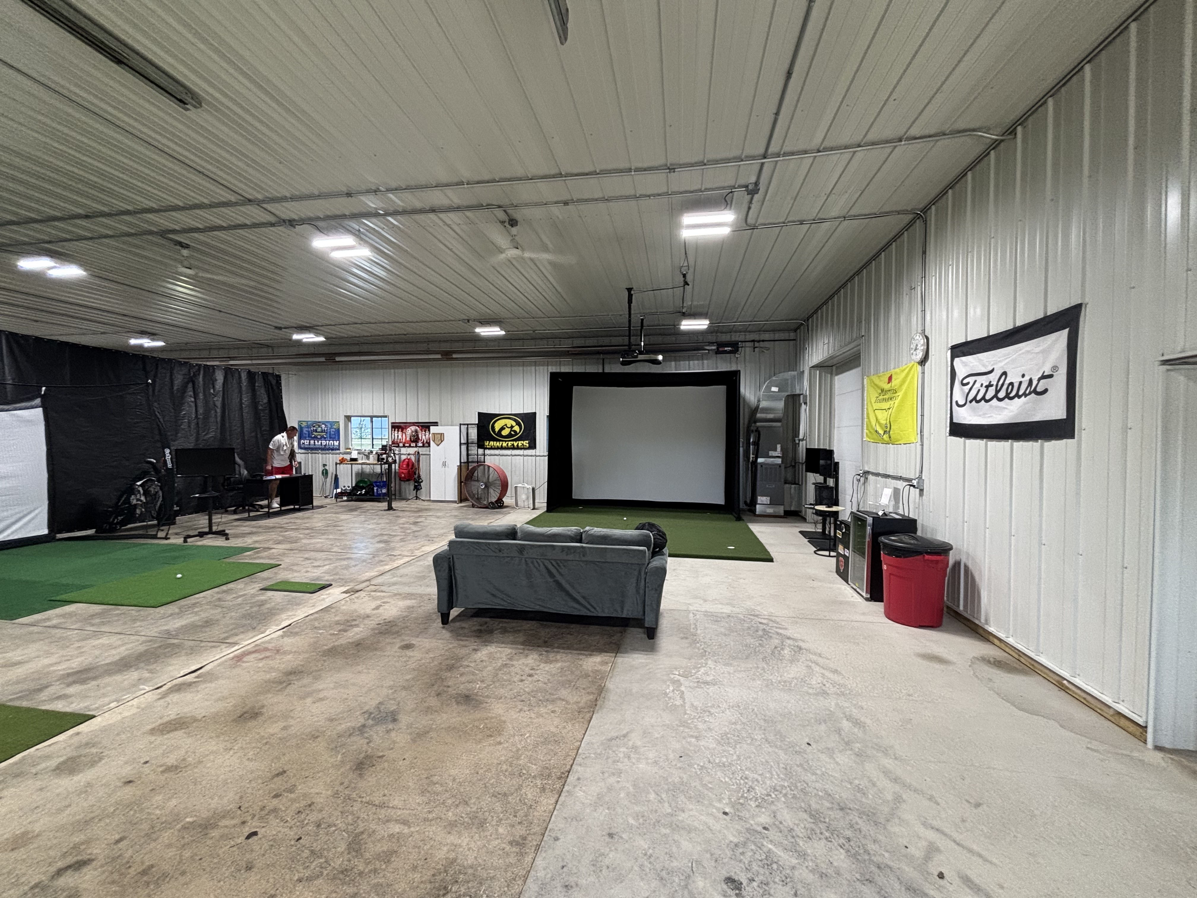 Indoor golf simulator and hitting bays at Schowen Skills