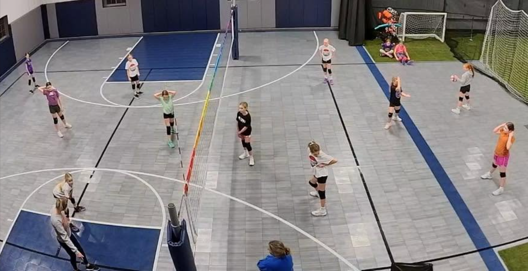 Volleyball practice on the indoor court at Schowen Skills